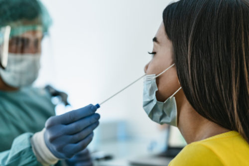 woman getting a covid test