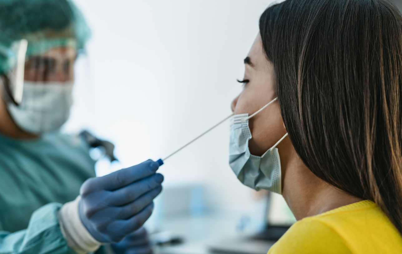 woman getting a covid test