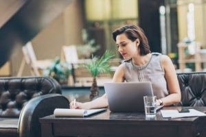 An attorney works at a desk at a law firm