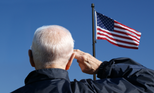 Man saluting the American flag