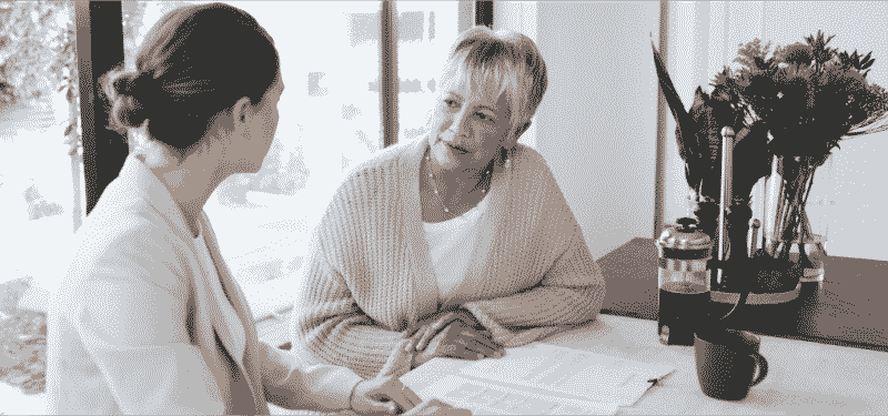 A lawyer consults with a client