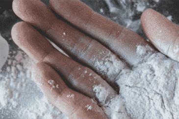 Talcum powder in hand